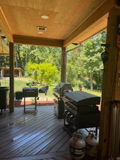Covered deck with outdoor kitchen