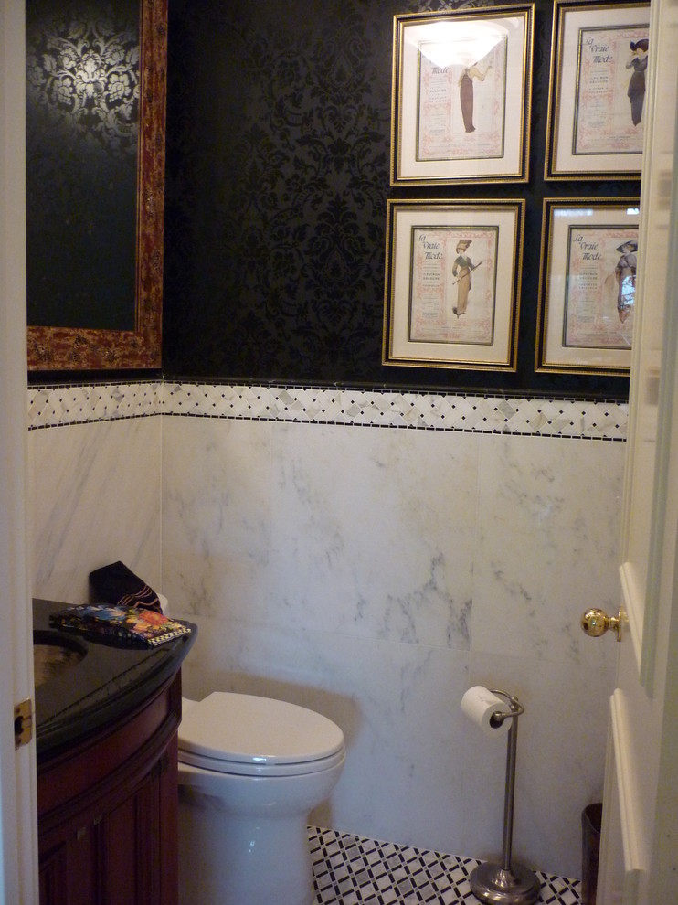 This is an example of a large contemporary powder room in Miami with shaker cabinets, a two-piece toilet, gray tile, porcelain tile, black walls and ceramic floors.