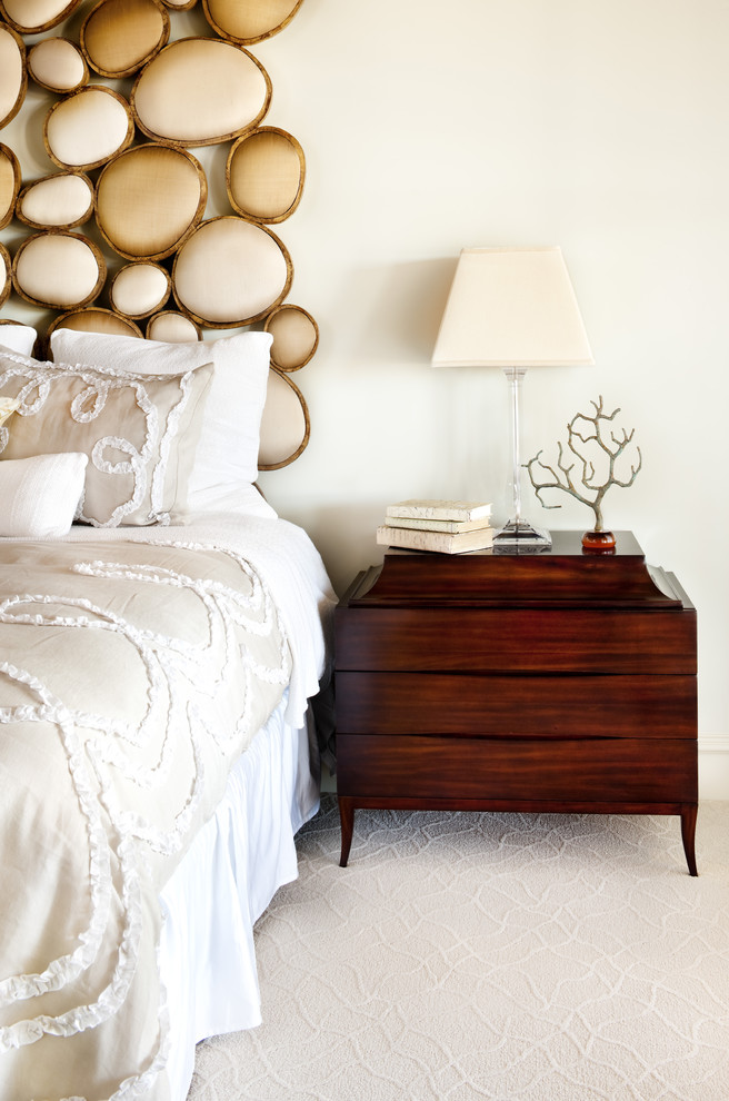 Photo of a transitional bedroom in Austin with beige walls.