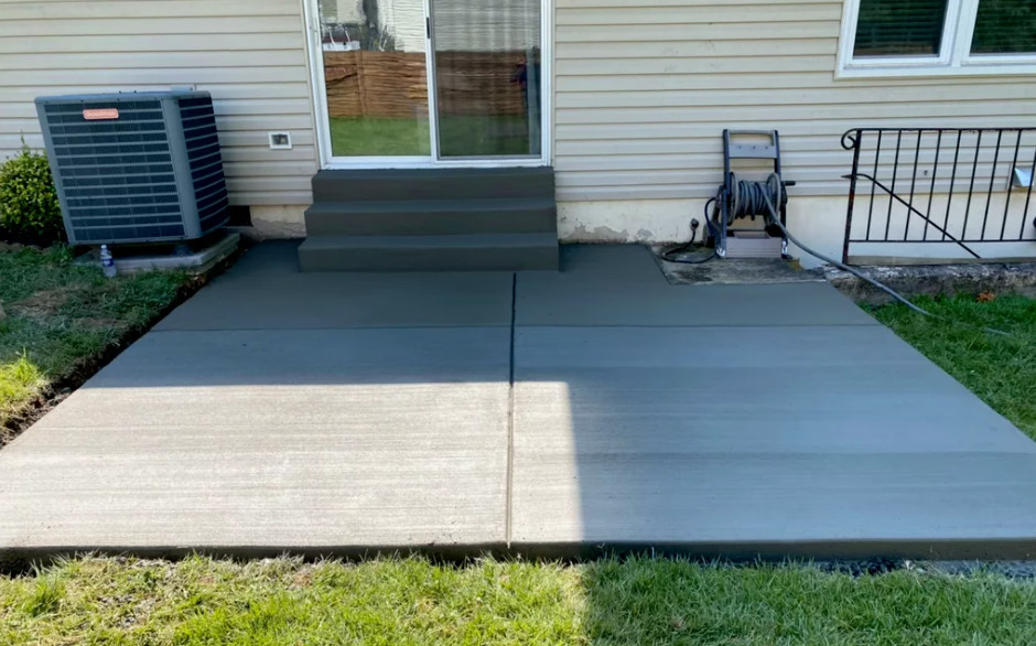 Concrete Patio with Entrance Stairs
