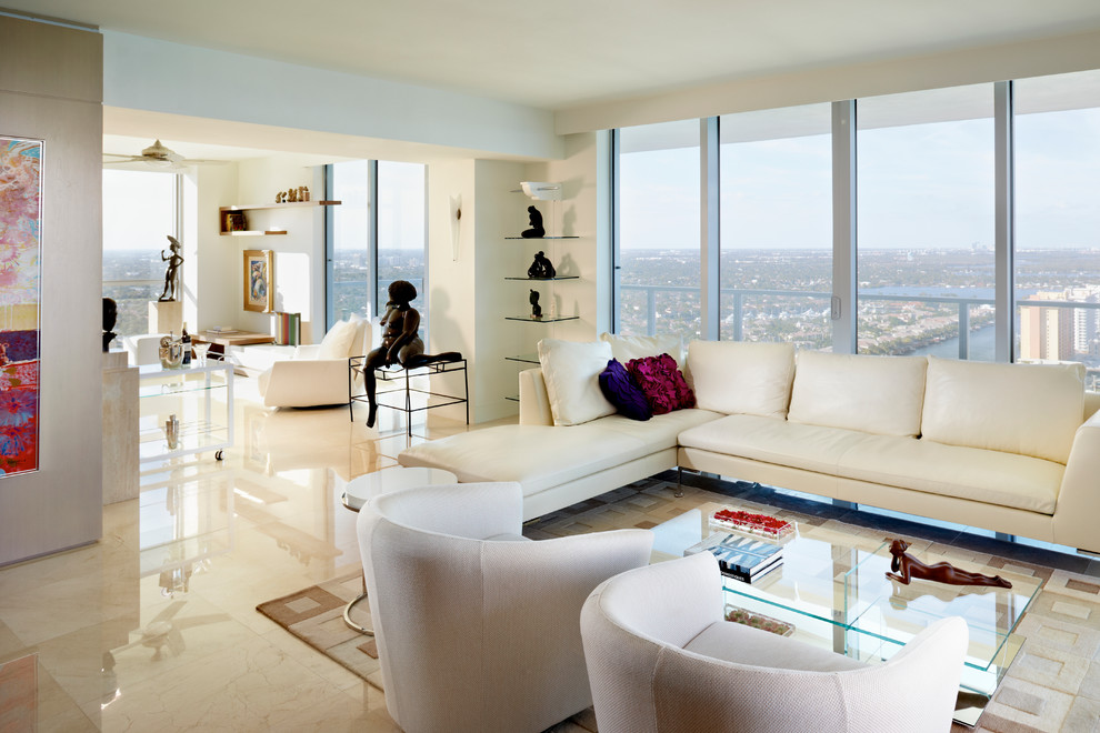 Design ideas for a contemporary open concept family room in Miami.