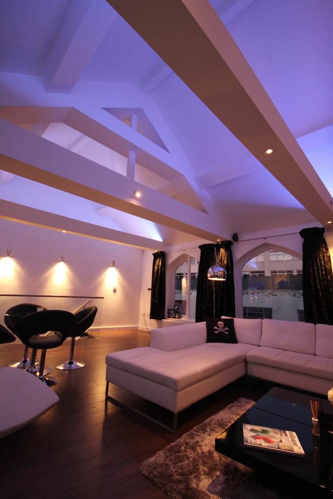 This is an example of a contemporary living room in West Midlands.