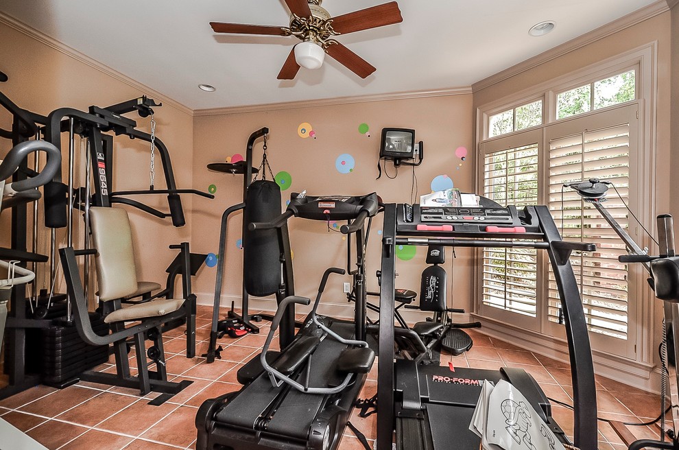 Photo of a transitional home gym in Charlotte.