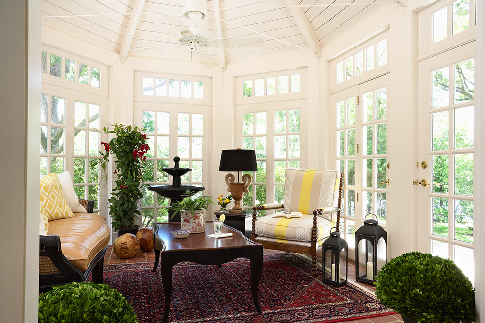 Photo of a traditional sunroom in Minneapolis with brick floors and a standard ceiling.