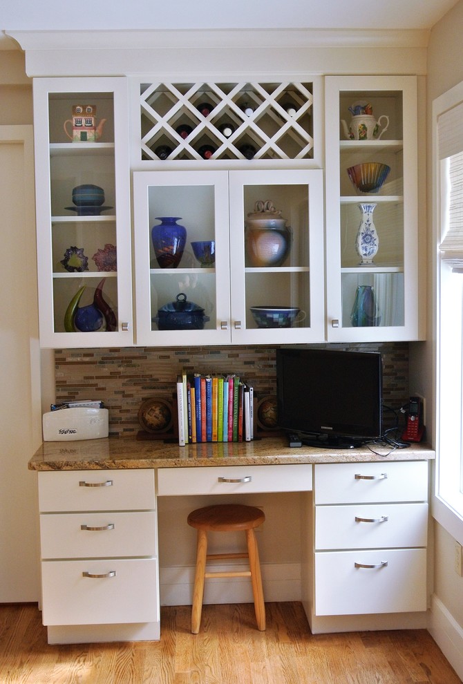 Transitional light wood floor kitchen photo in Boston with white cabinets, granite countertops, an undermount sink, shaker cabinets, stainless steel appliances and an island