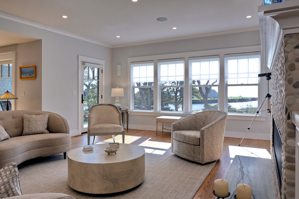 Photo of a large beach style living room in Boston.