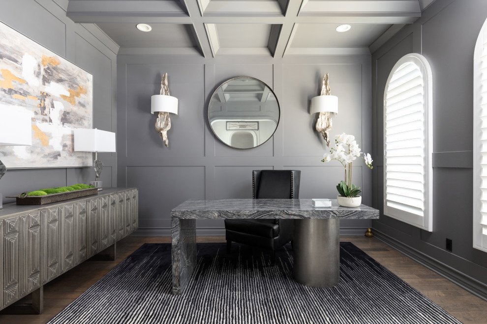 Mid-sized transitional study room in Los Angeles with grey walls, medium hardwood floors, a freestanding desk, brown floor, coffered, decorative wall panelling and no fireplace.
