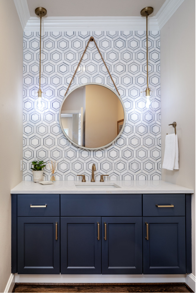 Small contemporary bathroom in Seattle with shaker cabinets, blue cabinets, gray tile, marble, grey walls, medium hardwood floors, an undermount sink, engineered quartz benchtops, brown floor and white benchtops.