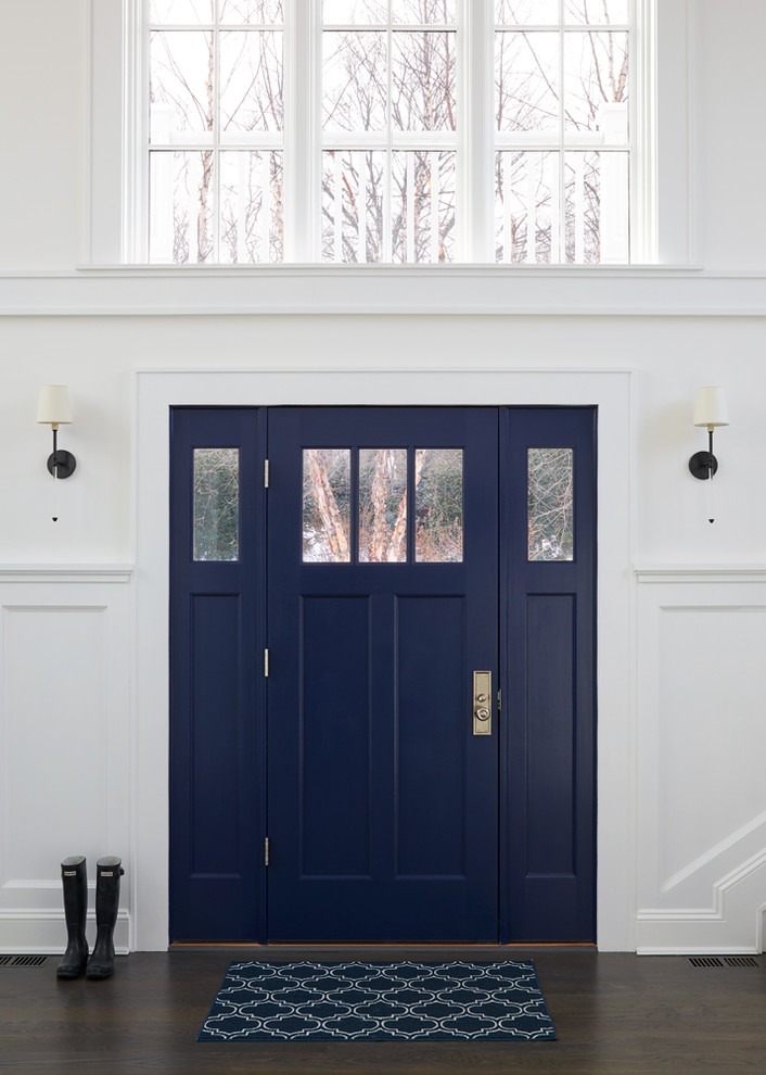 Design ideas for a mid-sized transitional front door in New York with white walls, dark hardwood floors, a single front door and a blue front door.