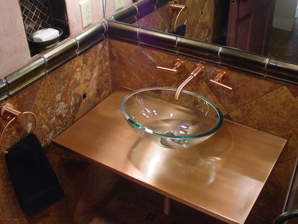 This is an example of a contemporary powder room in Austin.