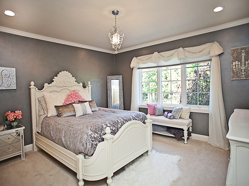 This is an example of a mid-sized traditional guest bedroom in New York with grey walls, carpet, no fireplace and beige floor.