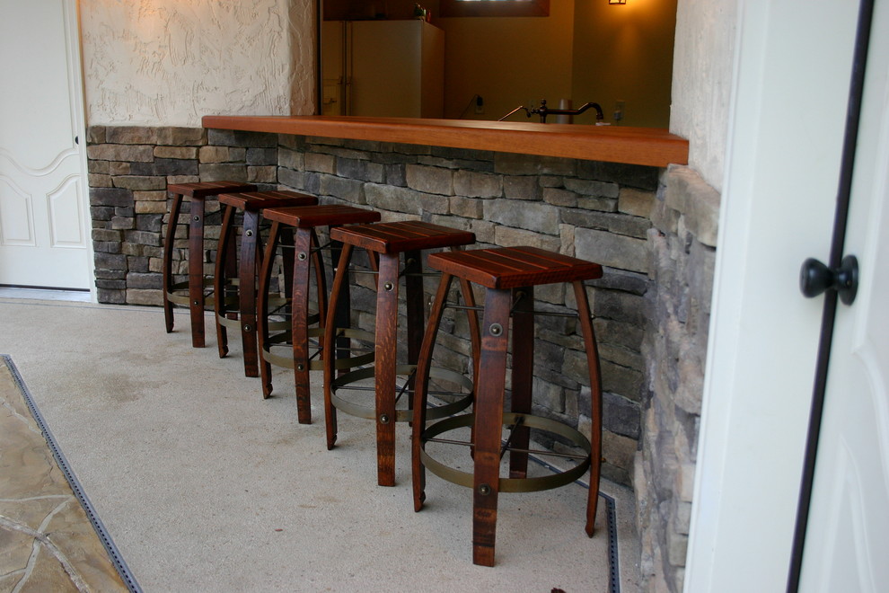 Inspiration for a large transitional backyard concrete paver patio kitchen remodel