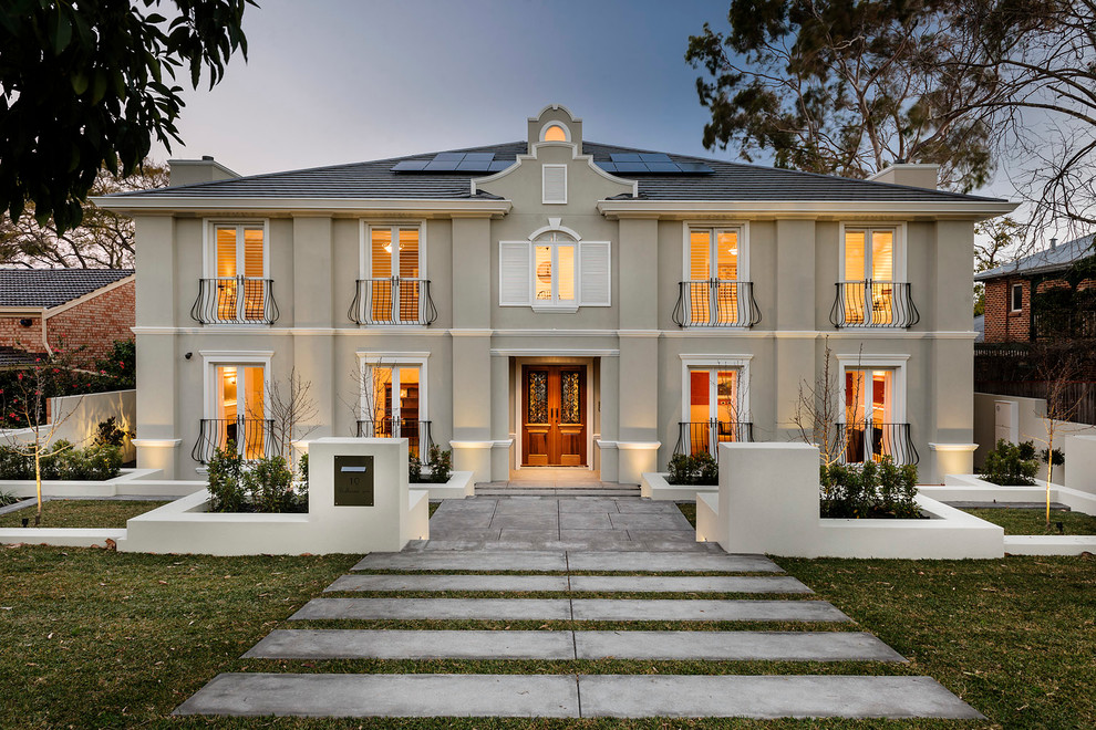 Inspiration for a mid-sized traditional two-storey exterior in Perth.