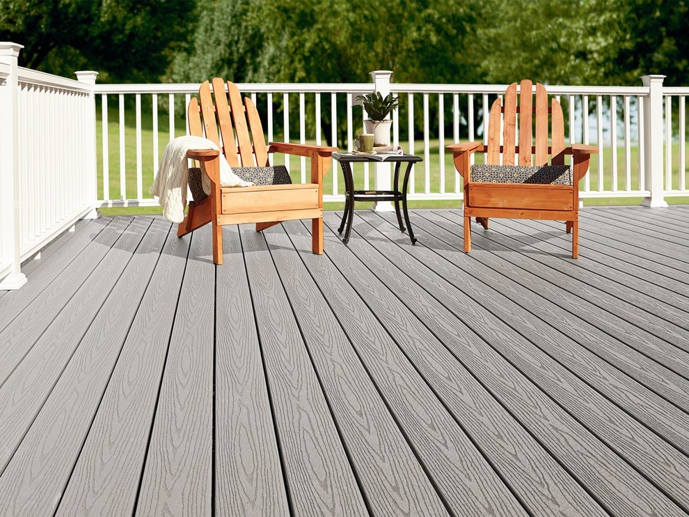 Example of a mid-sized backyard deck design with no cover