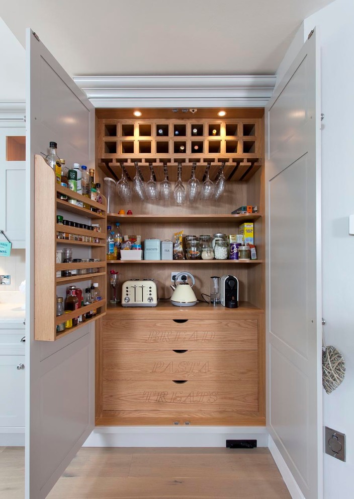 Example of a transitional kitchen design in Dublin