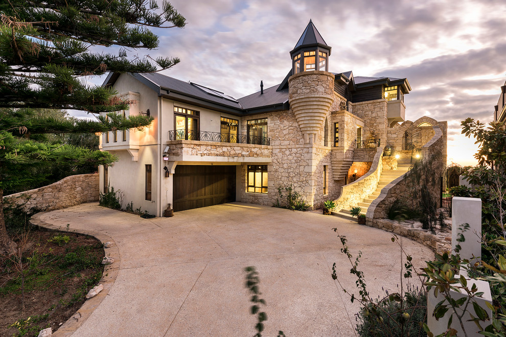 Design ideas for a large traditional three-storey exterior in Perth with stone veneer and a hip roof.