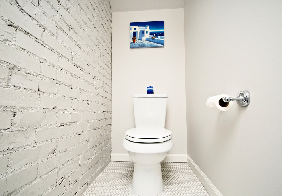 Design ideas for a small contemporary powder room in Seattle with a one-piece toilet, white tile, ceramic tile, white walls and ceramic floors.