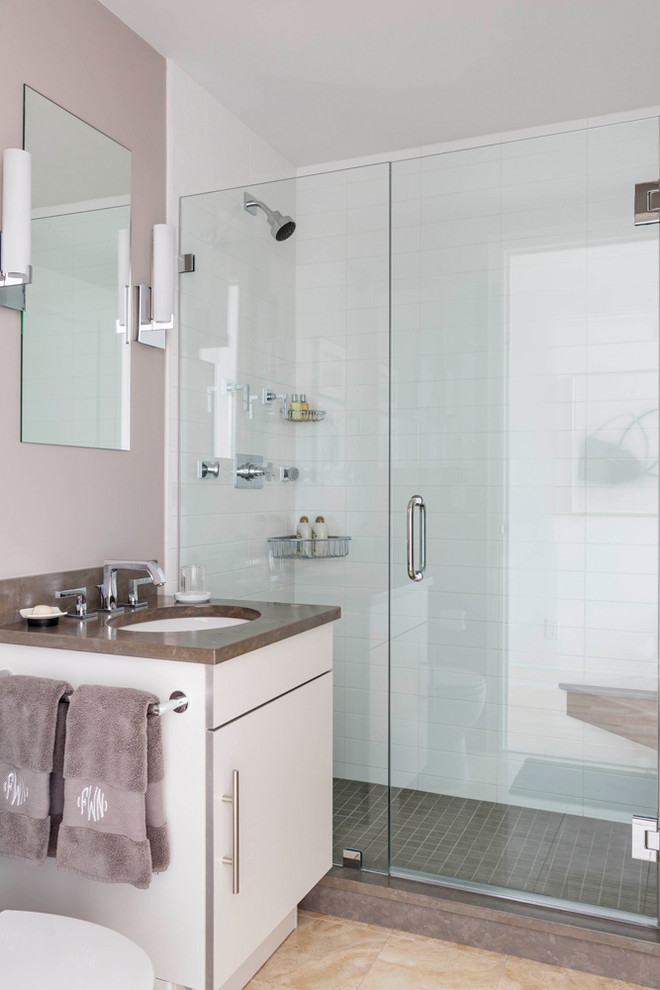 This is an example of a small contemporary bathroom in Boston with an integrated sink, flat-panel cabinets, white cabinets, engineered quartz benchtops, a double shower, white tile, ceramic tile, beige walls and ceramic floors.