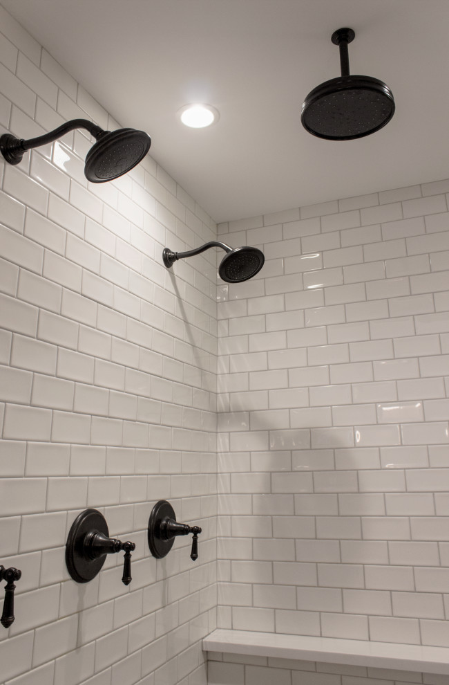 Double shower - large transitional master white tile and porcelain tile porcelain tile, beige floor and double-sink double shower idea in Chicago with shaker cabinets, brown cabinets, beige walls, quartzite countertops, a hinged shower door, white countertops and a built-in vanity