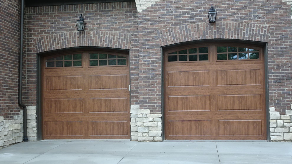 Photo of a mid-sized attached two-car garage in Detroit.