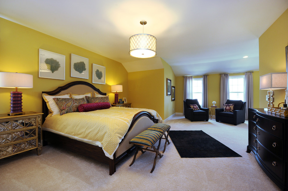 Inspiration for a large timeless master carpeted bedroom remodel in Raleigh with yellow walls