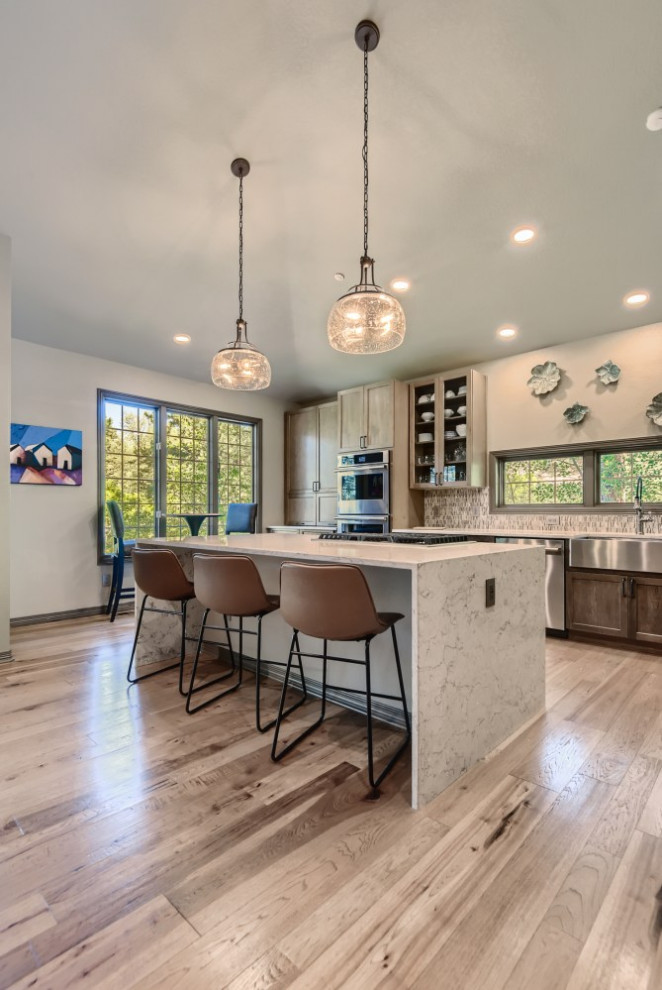 Example of a mountain style kitchen design in Denver
