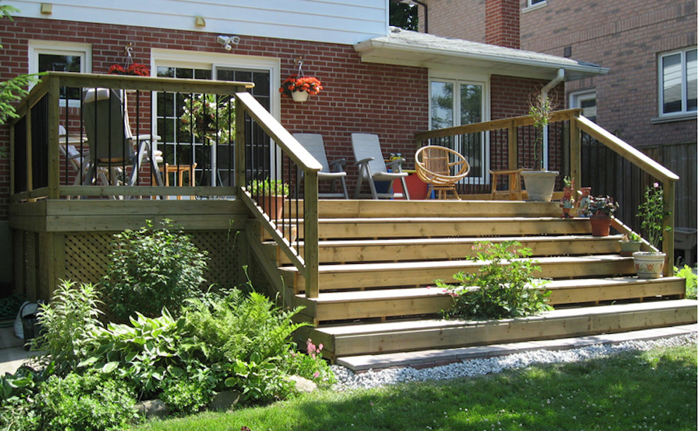 Inspiration for a small traditional backyard deck in Wichita with no cover.