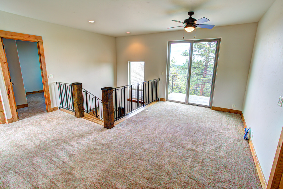 Large mountain style carpeted hallway photo with white walls