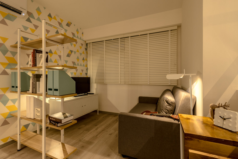 This is an example of a contemporary home office in Singapore.