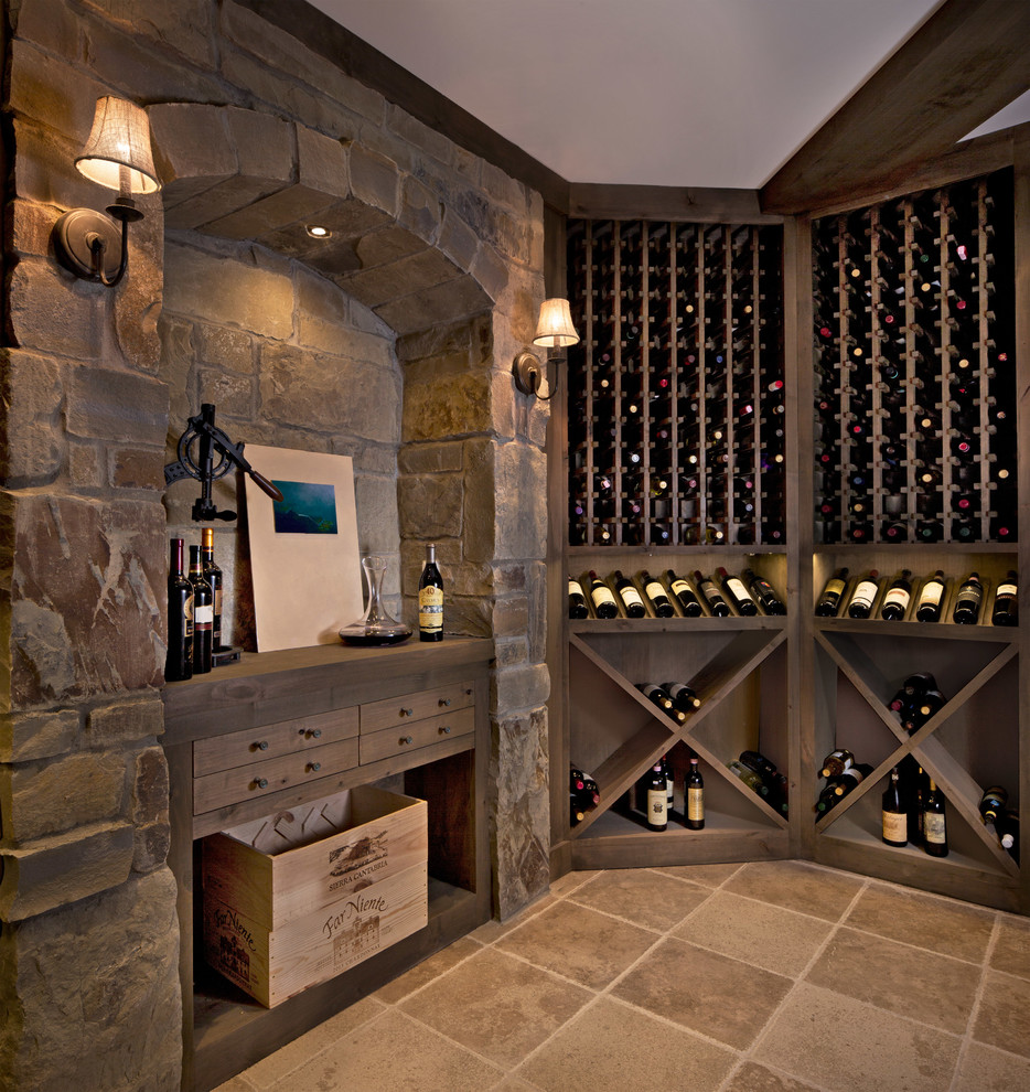 Transitional wine cellar in Detroit with storage racks and beige floor.
