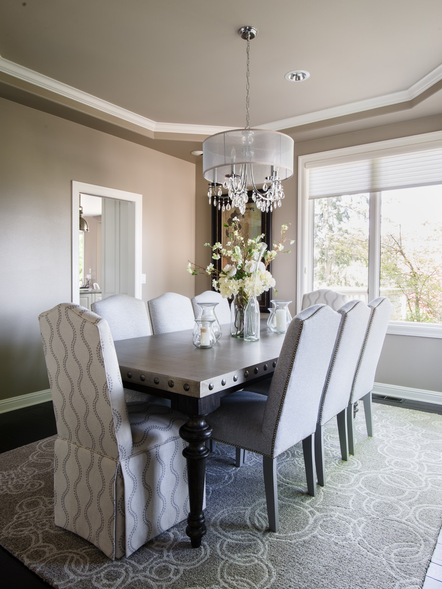 Inspiration for a mid-sized transitional separate dining room in Seattle with grey walls, dark hardwood floors, no fireplace and brown floor.