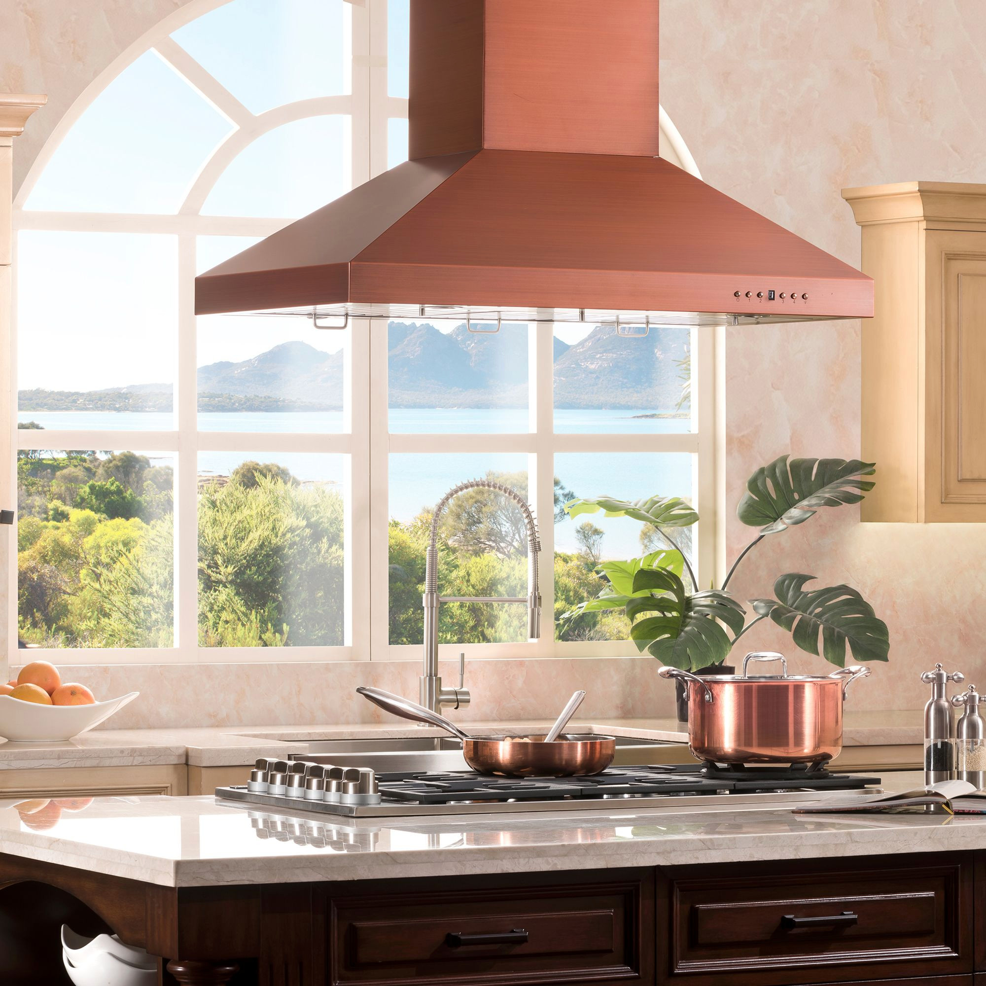 Kitchens featuring a ZLINE Copper Wall Range Hood