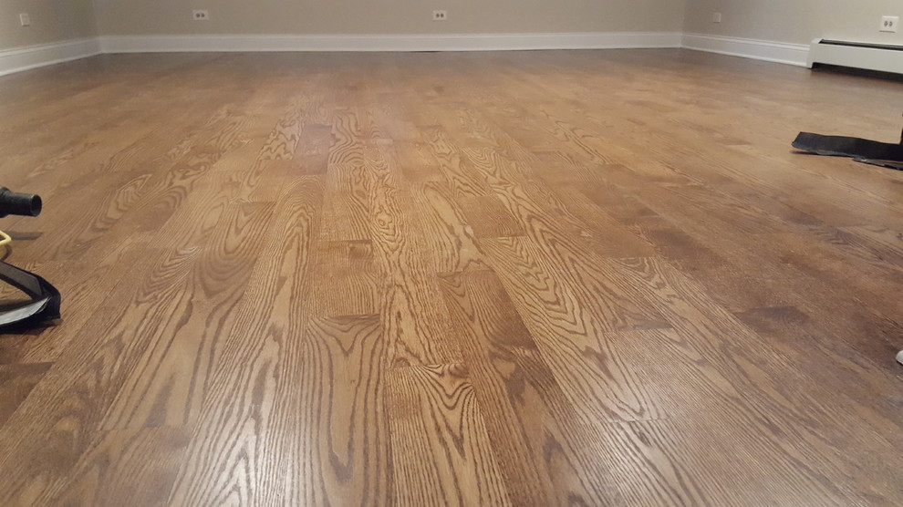 3 and 1/4 red oak select and better special walnut stain , satin water base fini