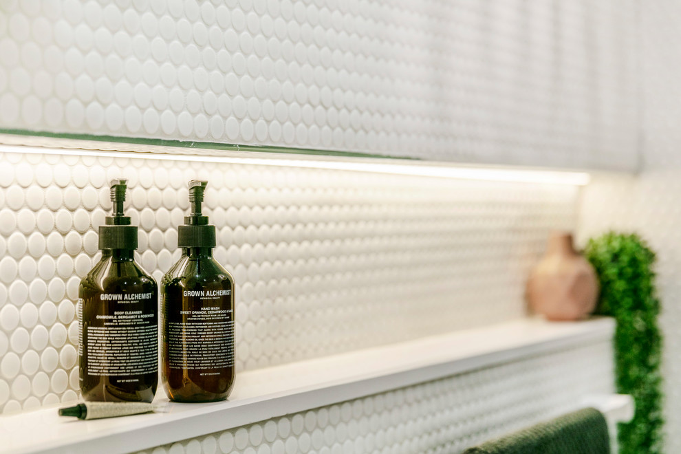 Inspiration for a mid-sized contemporary master bathroom in Melbourne with a freestanding tub, a double shower, white tile, mosaic tile, white walls, ceramic floors, wood benchtops and a sliding shower screen.