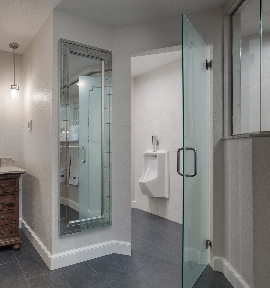 Large country master bathroom in Denver with furniture-like cabinets, distressed cabinets, a double shower, a two-piece toilet, white tile, porcelain tile, beige walls, ceramic floors, a drop-in sink, engineered quartz benchtops, grey floor, a hinged shower door and multi-coloured benchtops.