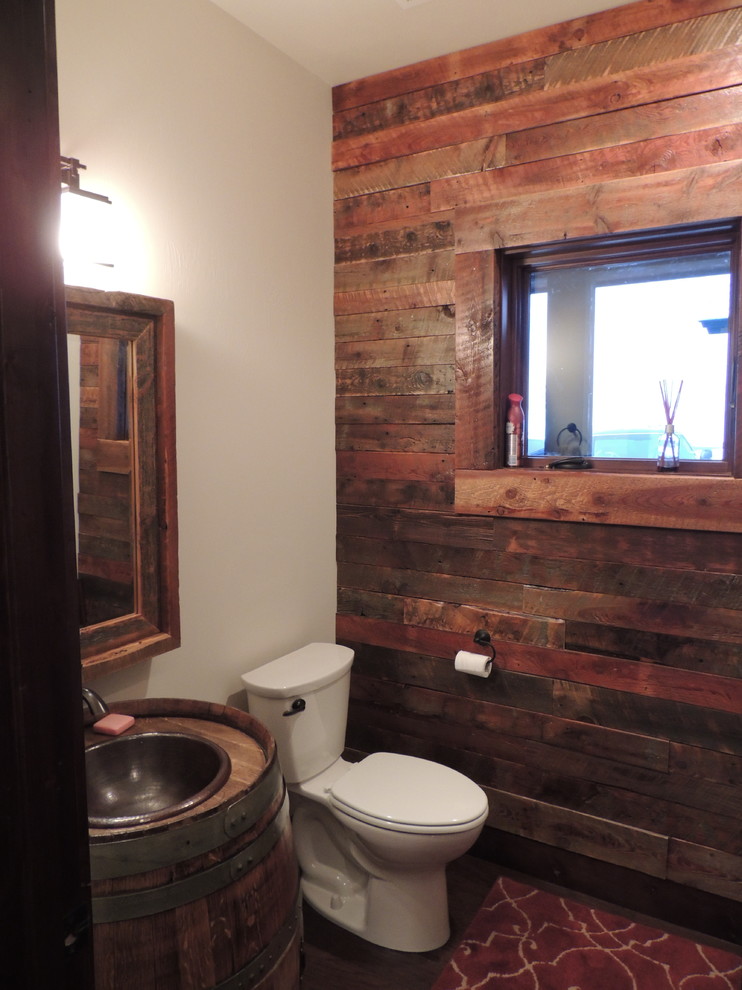 Inspiration for a small rustic 3/4 dark wood floor bathroom remodel in Other with a two-piece toilet and multicolored walls