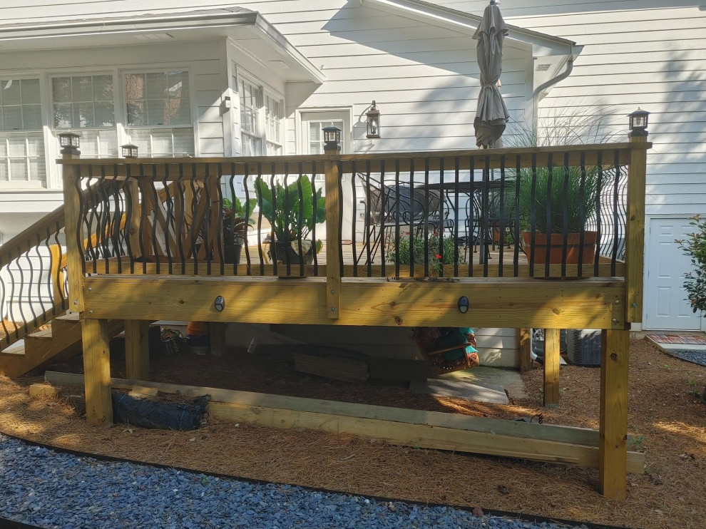 Transitional backyard deck photo