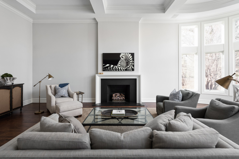 Inspiration for a large transitional formal open concept living room in Chicago with dark hardwood floors, brown floor, coffered, grey walls, a standard fireplace, a stone fireplace surround and a wall-mounted tv.