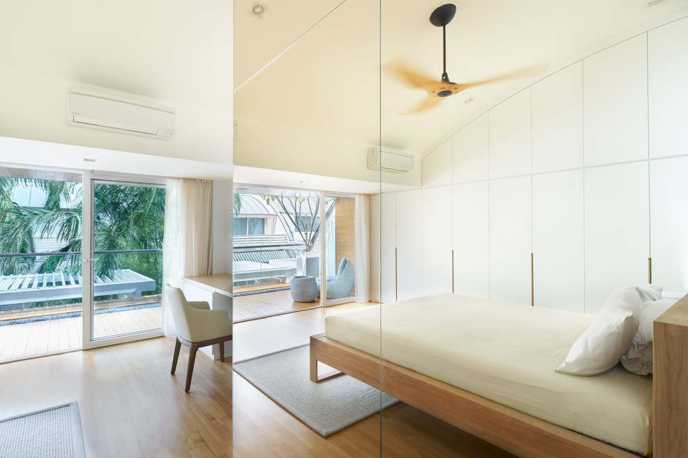 Photo of a contemporary bedroom in Singapore.