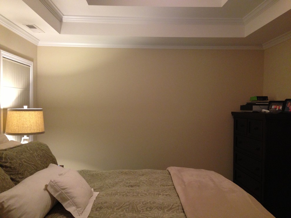 empty master bedroom with bed