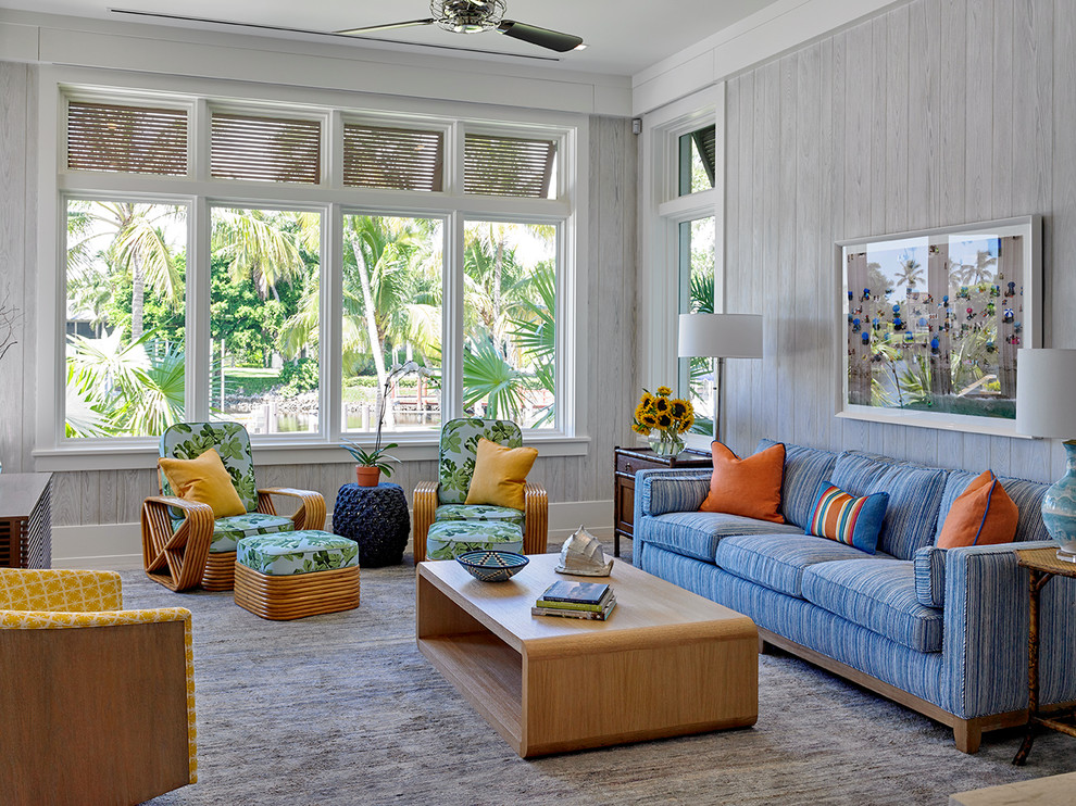 Photo of a tropical family room in Miami.