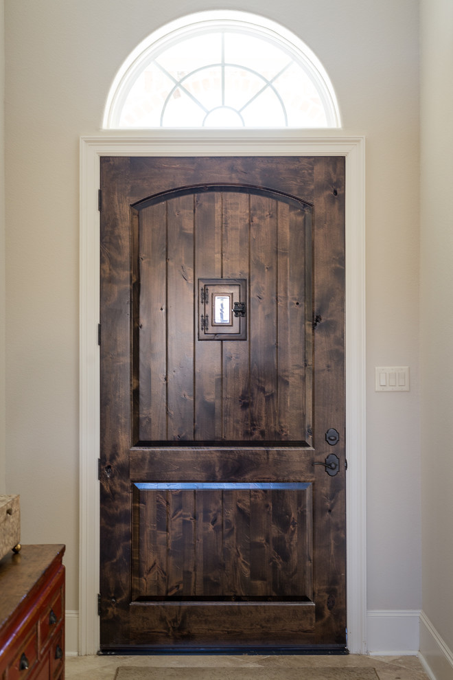 Example of a transitional entryway design in Houston