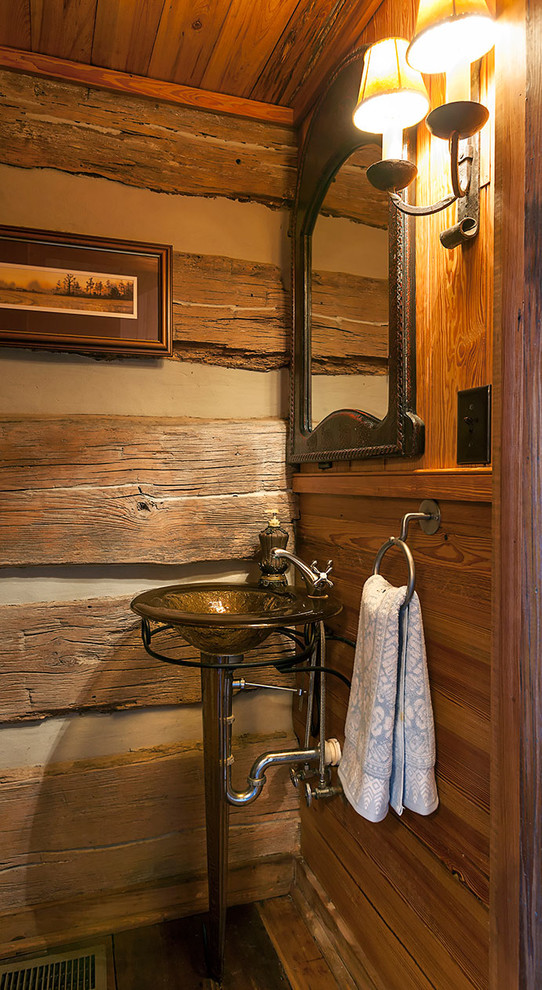 Photo of a small country powder room in Charleston with a vessel sink.