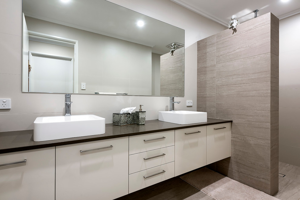 Design ideas for a master bathroom in Perth with white cabinets, an alcove shower, a one-piece toilet, white tile, porcelain tile, porcelain floors, engineered quartz benchtops, brown floor, an open shower, brown benchtops, an enclosed toilet, a double vanity and a floating vanity.