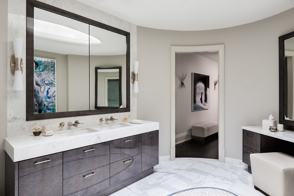 Inspiration for a large contemporary master bathroom in Toronto with flat-panel cabinets, brown cabinets, beige walls, marble floors, an undermount sink, marble benchtops, white floor, white benchtops, a double vanity, a built-in vanity and vaulted.