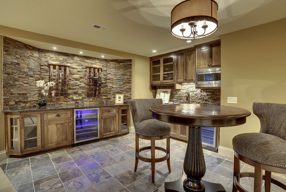 Example of a large transitional home bar design in Minneapolis