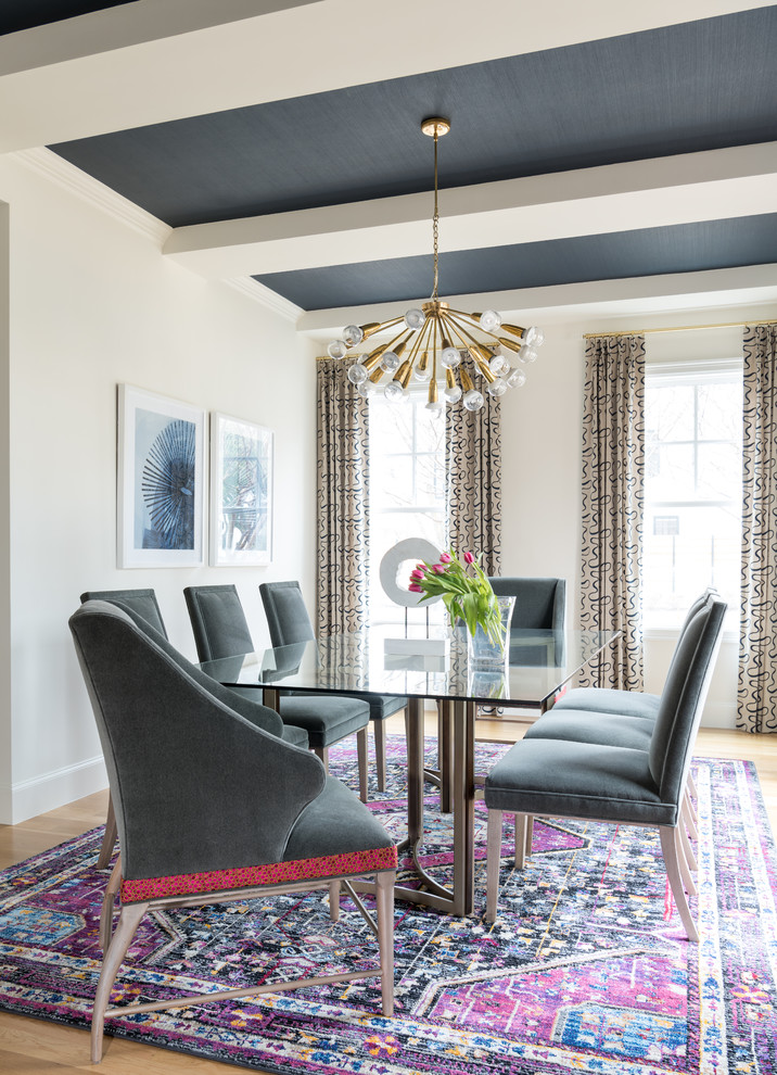 Example of a trendy light wood floor and beige floor dining room design in Dallas with beige walls