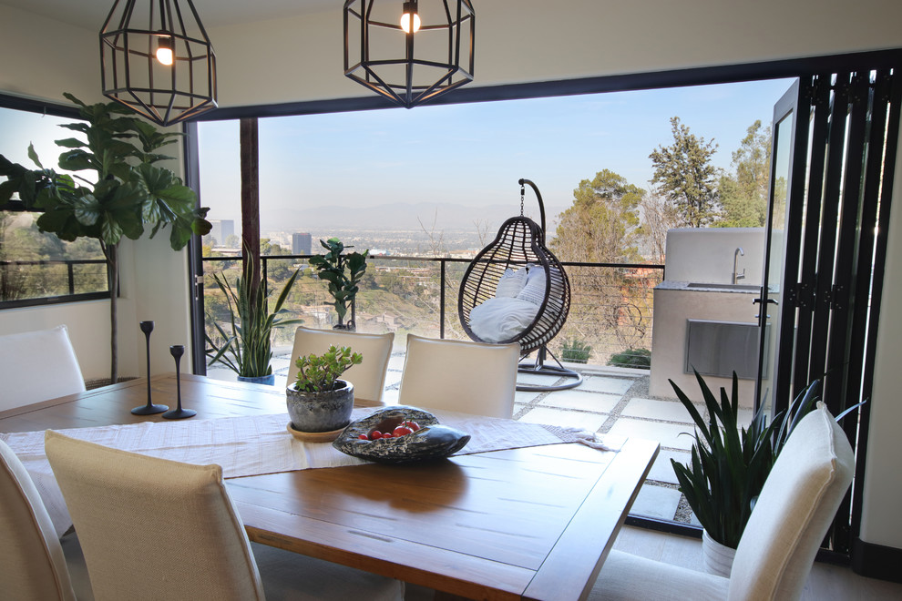 Design ideas for a mid-sized eclectic open plan dining in Los Angeles.