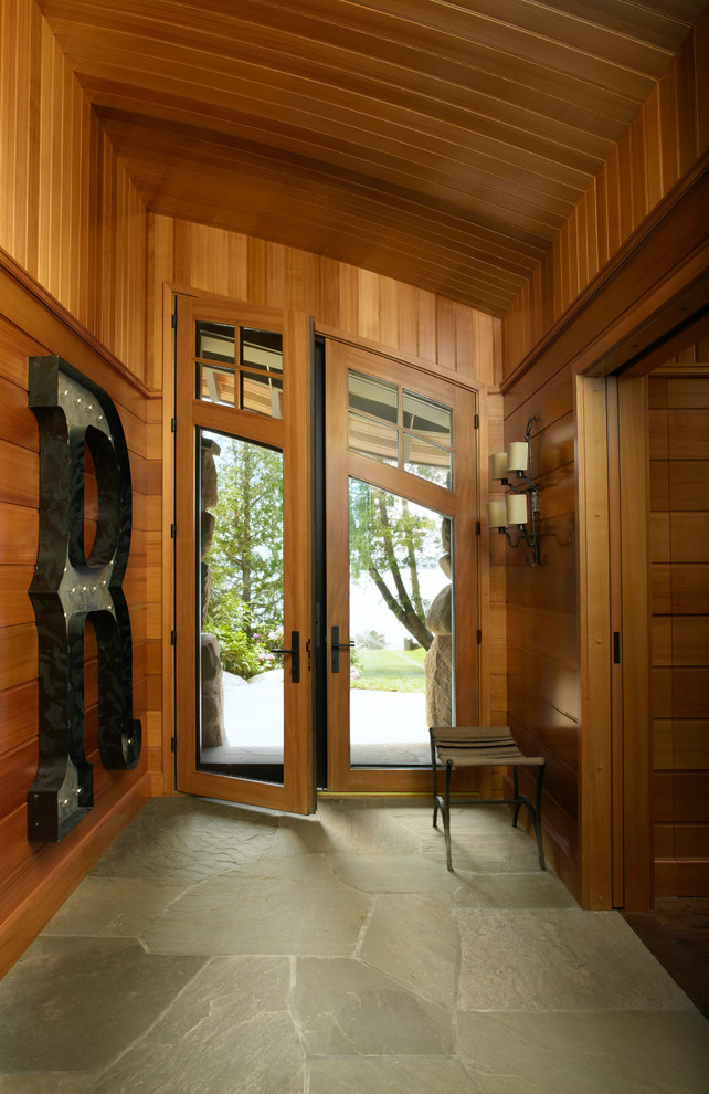 Contemporary entryway in Chicago with a double front door and a glass front door.