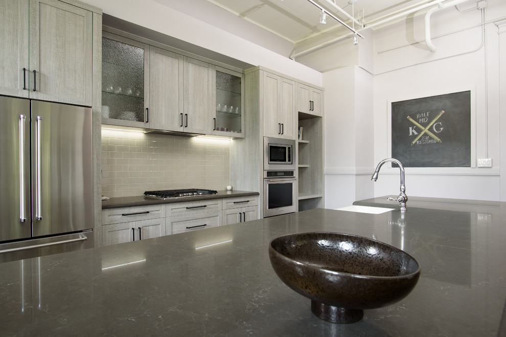 Example of a transitional kitchen design in Toronto